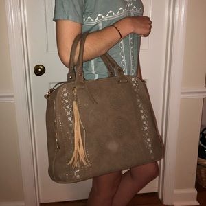 Perforated leather tote bag